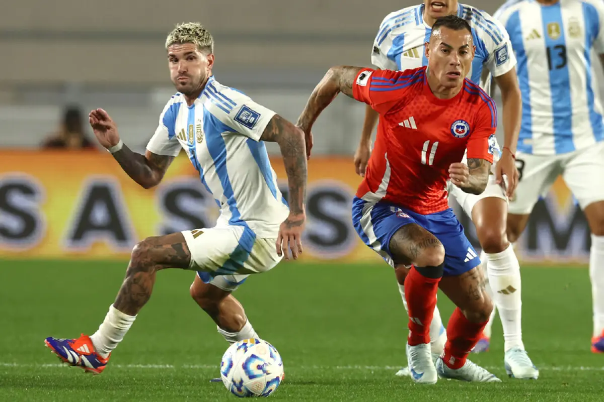 Rodrigo De Paul y Eduardo Vargas